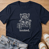 booked, raccoon reading a book T-shirt in navy by Moody Crew