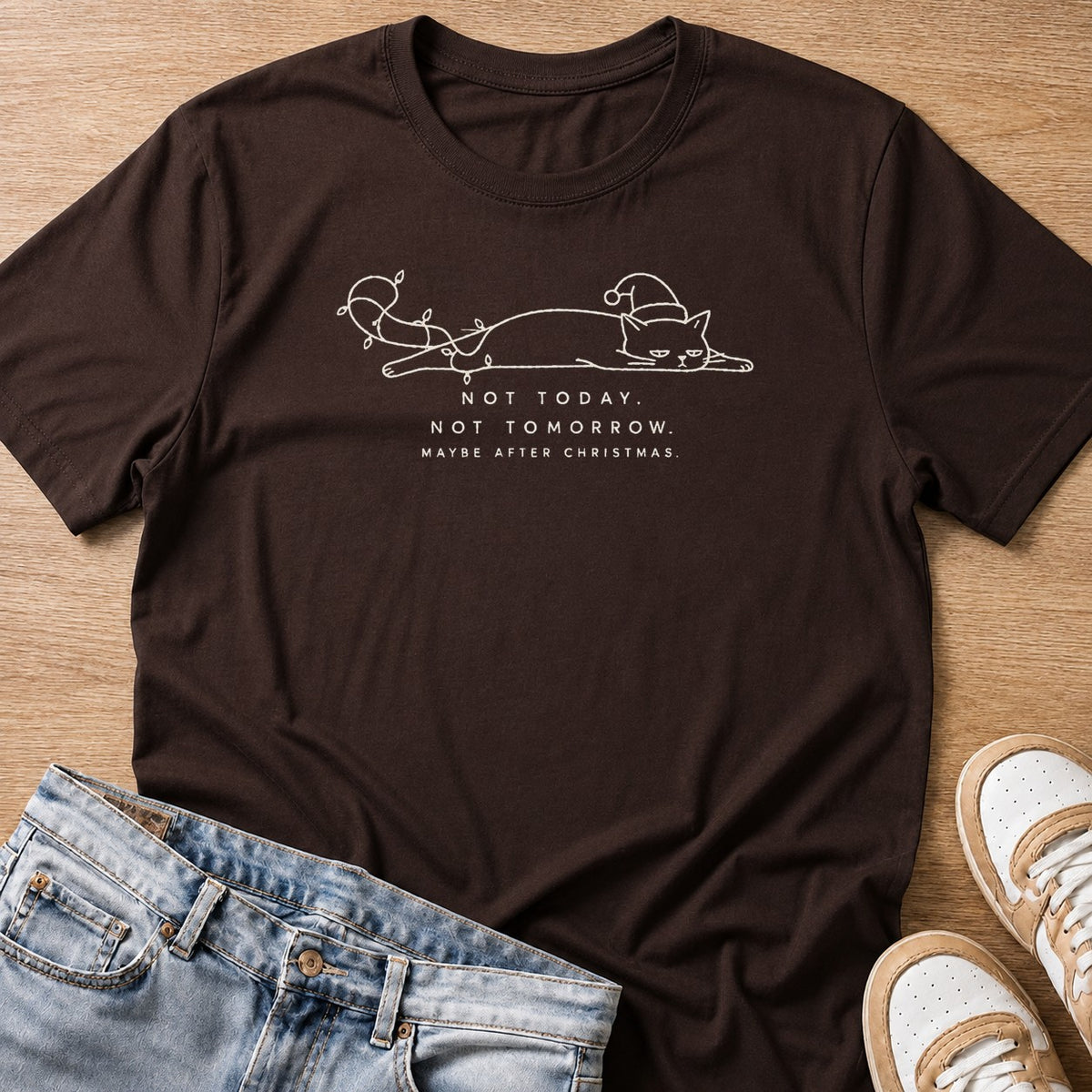 not today, not tomorrow, maybe after Christmas cat T-shirt in dark chocolate by Moody Crew