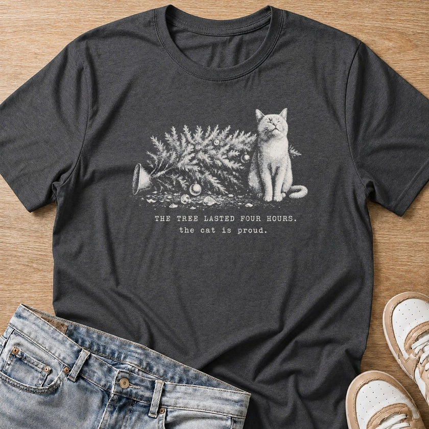 the tree lasted four hours, the cat is proud Christmas T-shirt in dark heather by Moody Crew